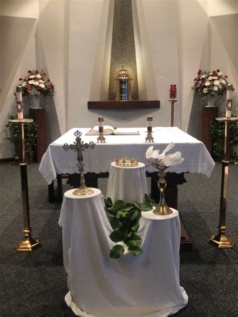 Holy Trinity centered on red altar