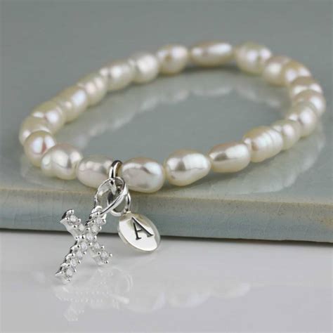 Freshwater pearl cross bracelet closeup